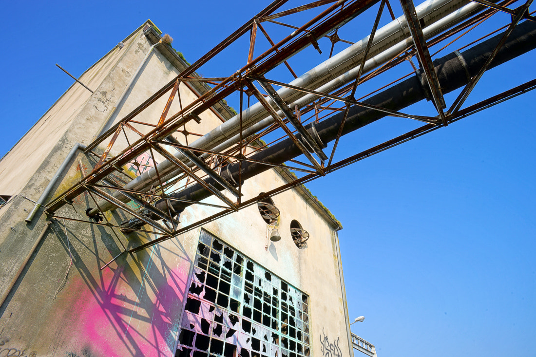 Sony a99 II + 20mm F2.8 sample photo. Old abandoned plant with graffity on walls photography