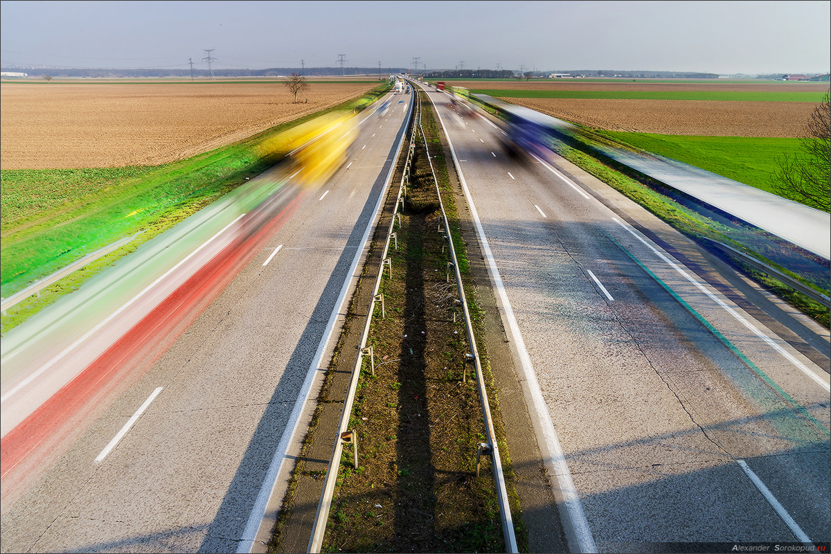 Sony a99 II + Tamron SP 24-70mm F2.8 Di VC USD sample photo. Blurred vehicles driving on motorway in france photography