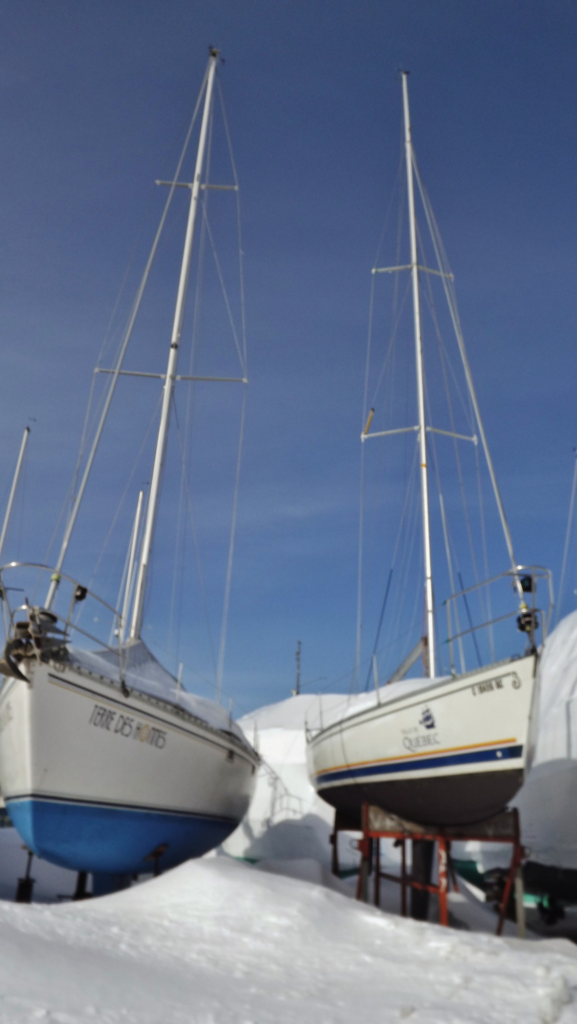 Fujifilm FinePix S3400 sample photo. Two boats in the white snow photography