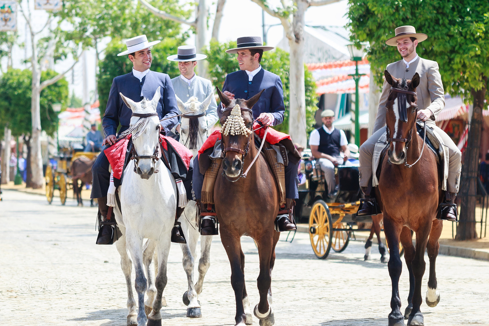Canon EOS 30D sample photo. Horse riders taking a walk by the fair of seville photography