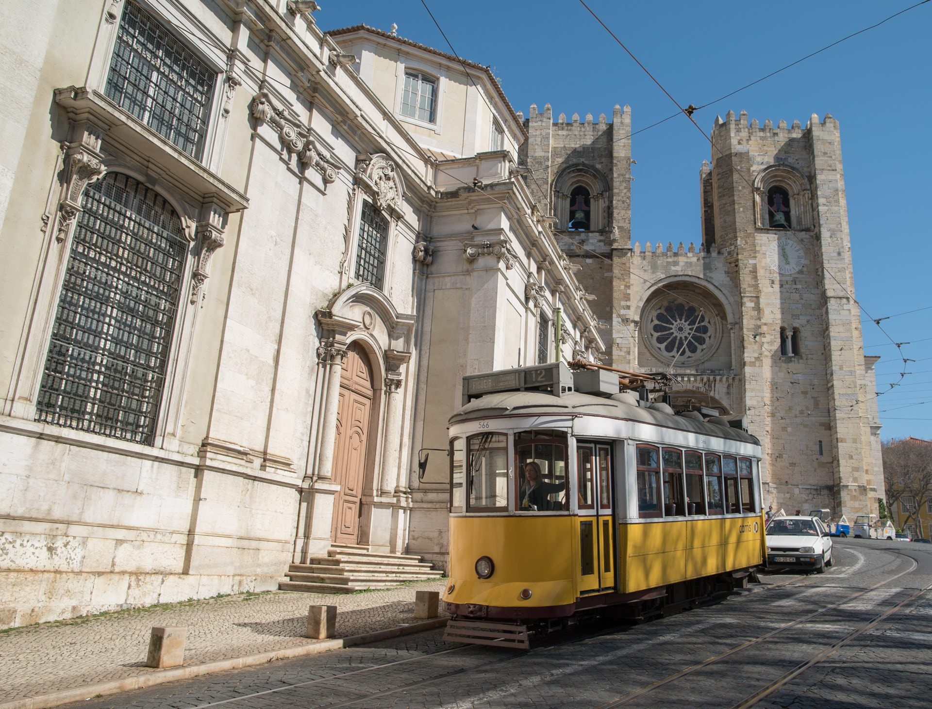 Sony a7S + Canon EF 24mm F1.4L II USM sample photo. Lisbon's famous trams in alfama photography