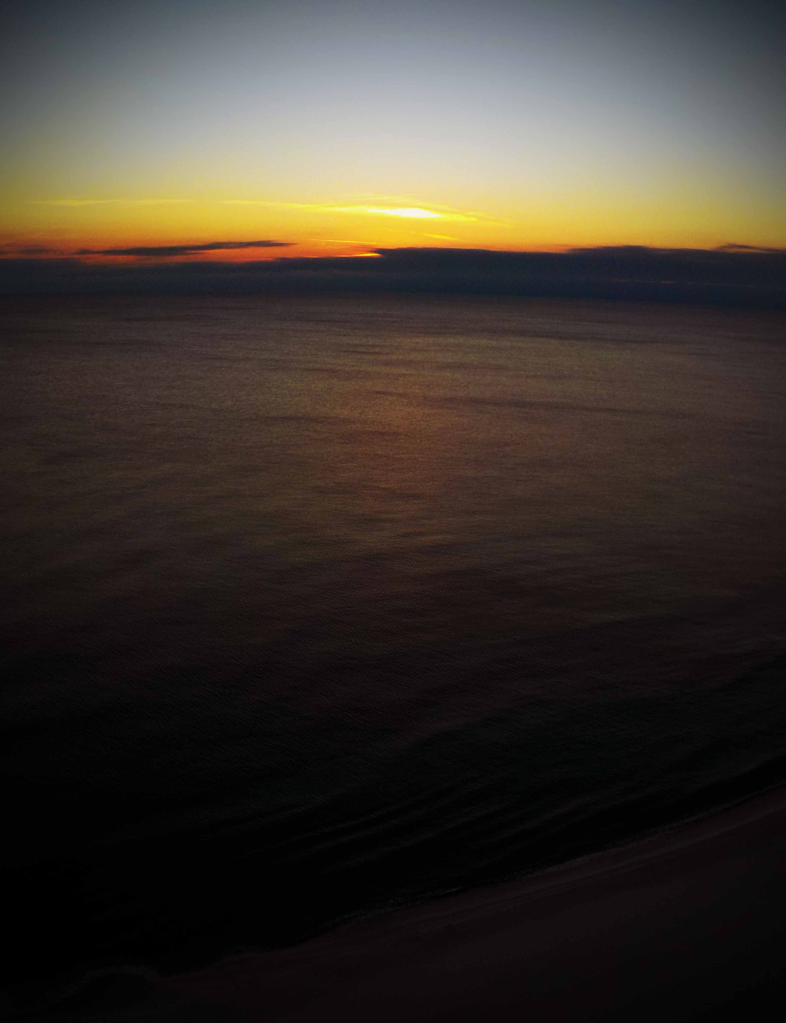 Nikon Coolpix S32 sample photo. Dark sunset on the ocean photography