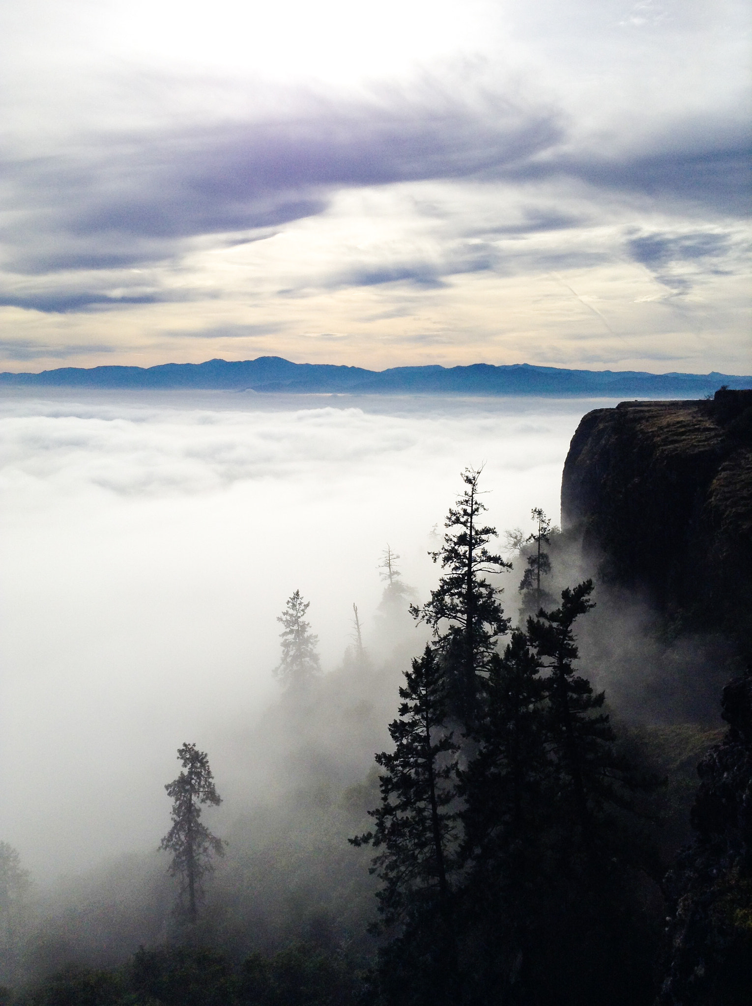 iPod touch back camera 3.3mm f/2.4 sample photo. Above the clouds photography