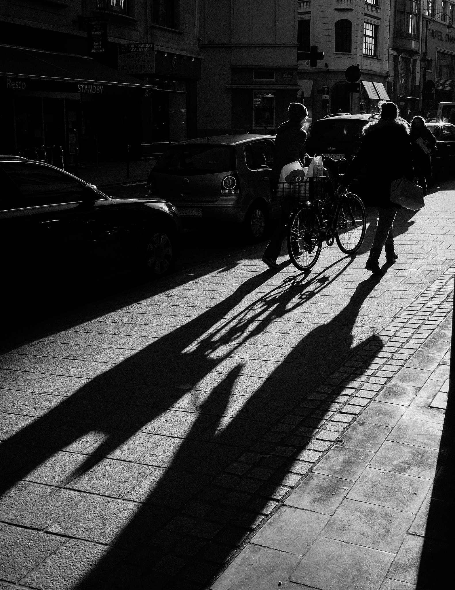 Olympus OM-D E-M10 + Panasonic Lumix G 20mm F1.7 ASPH sample photo. One bike between two photography