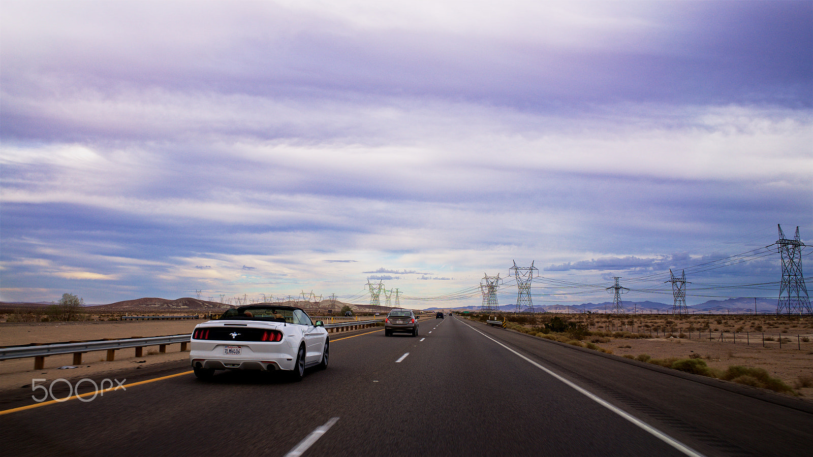 Sony FE 28mm F2 sample photo. White mustang on the road photography
