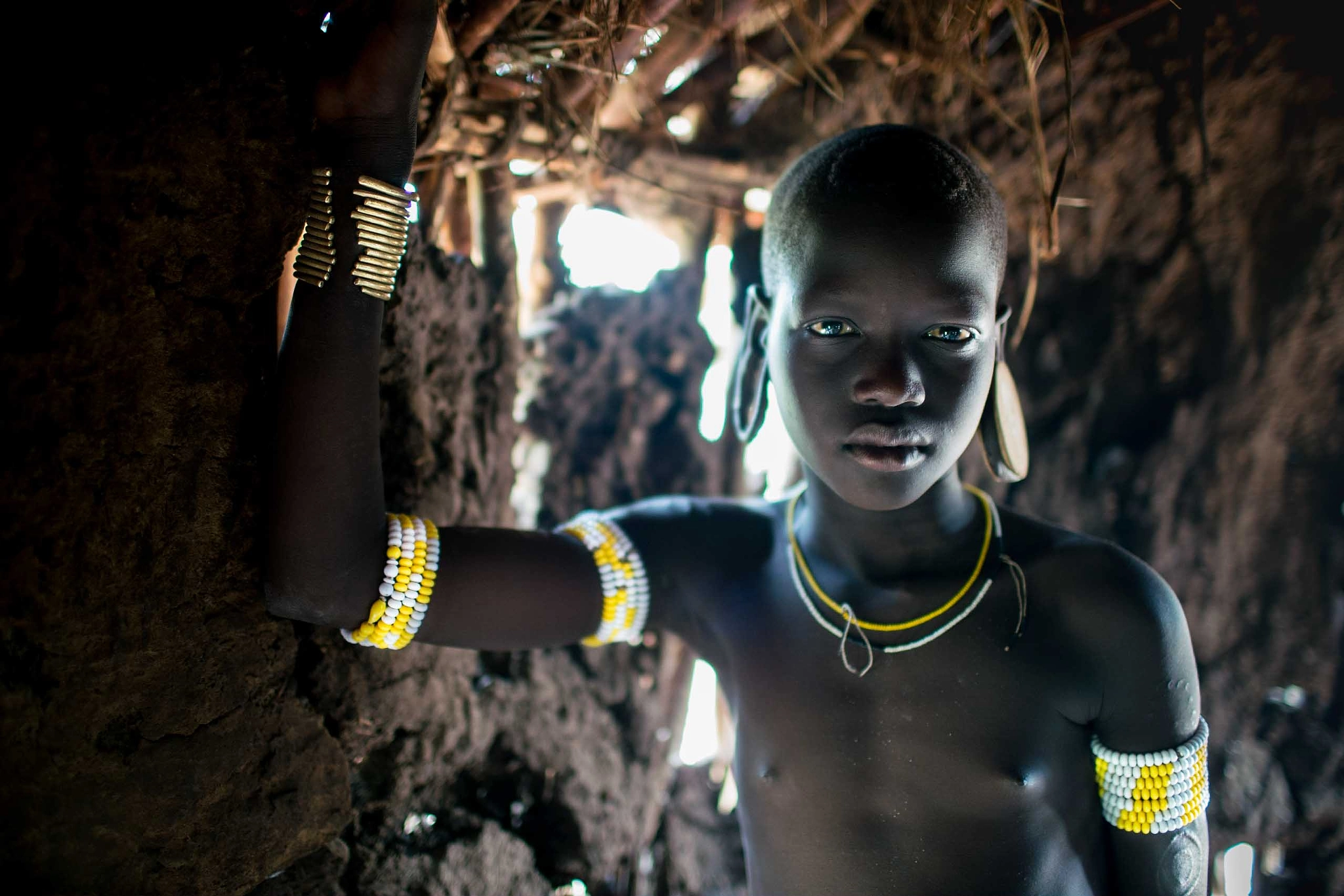 Sony a7R II + Canon EF 35mm F1.4L USM sample photo. Portrait of a mursi girl photography