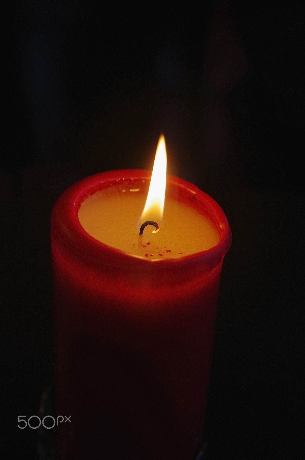 Pentax K-x sample photo. One candle burning photography