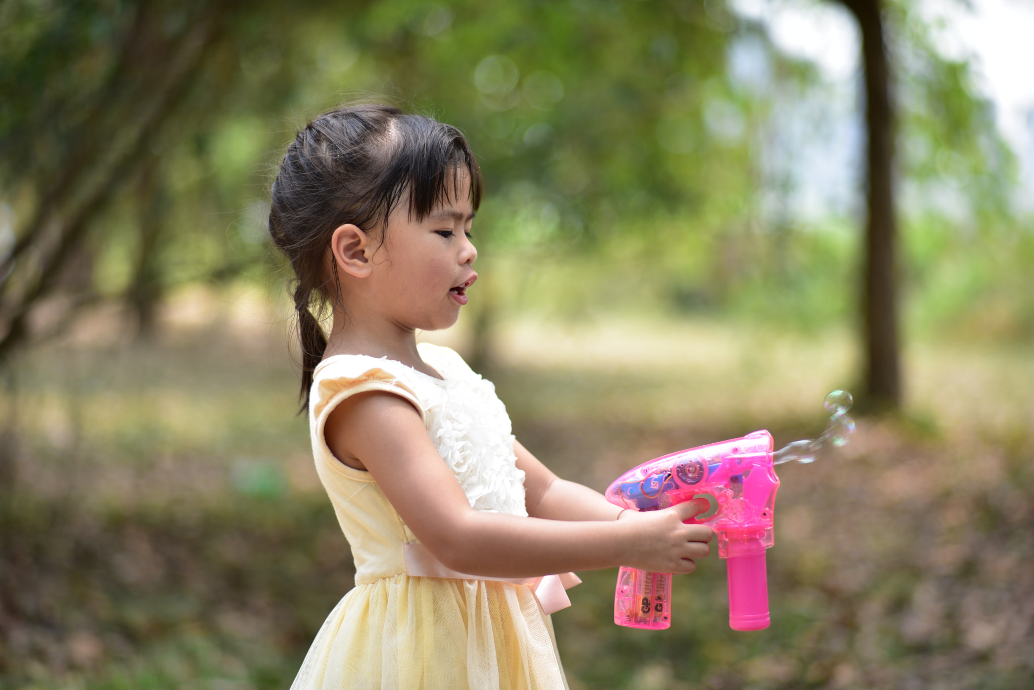 Manual Lens No CPU sample photo. Playing bubble gun in park photography