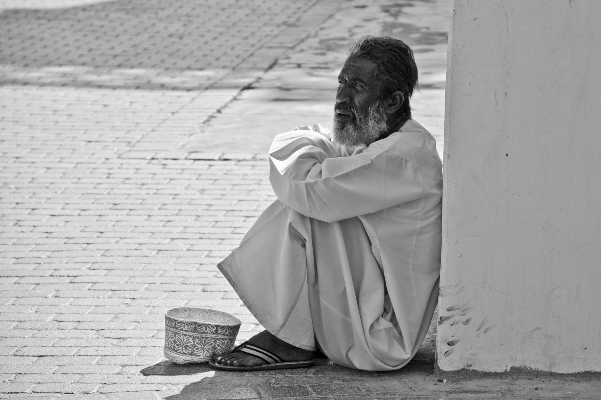 Nikon D5100 + Sigma 18-125mm F3.8-5.6 DC OS HSM sample photo. Man in muscat photography