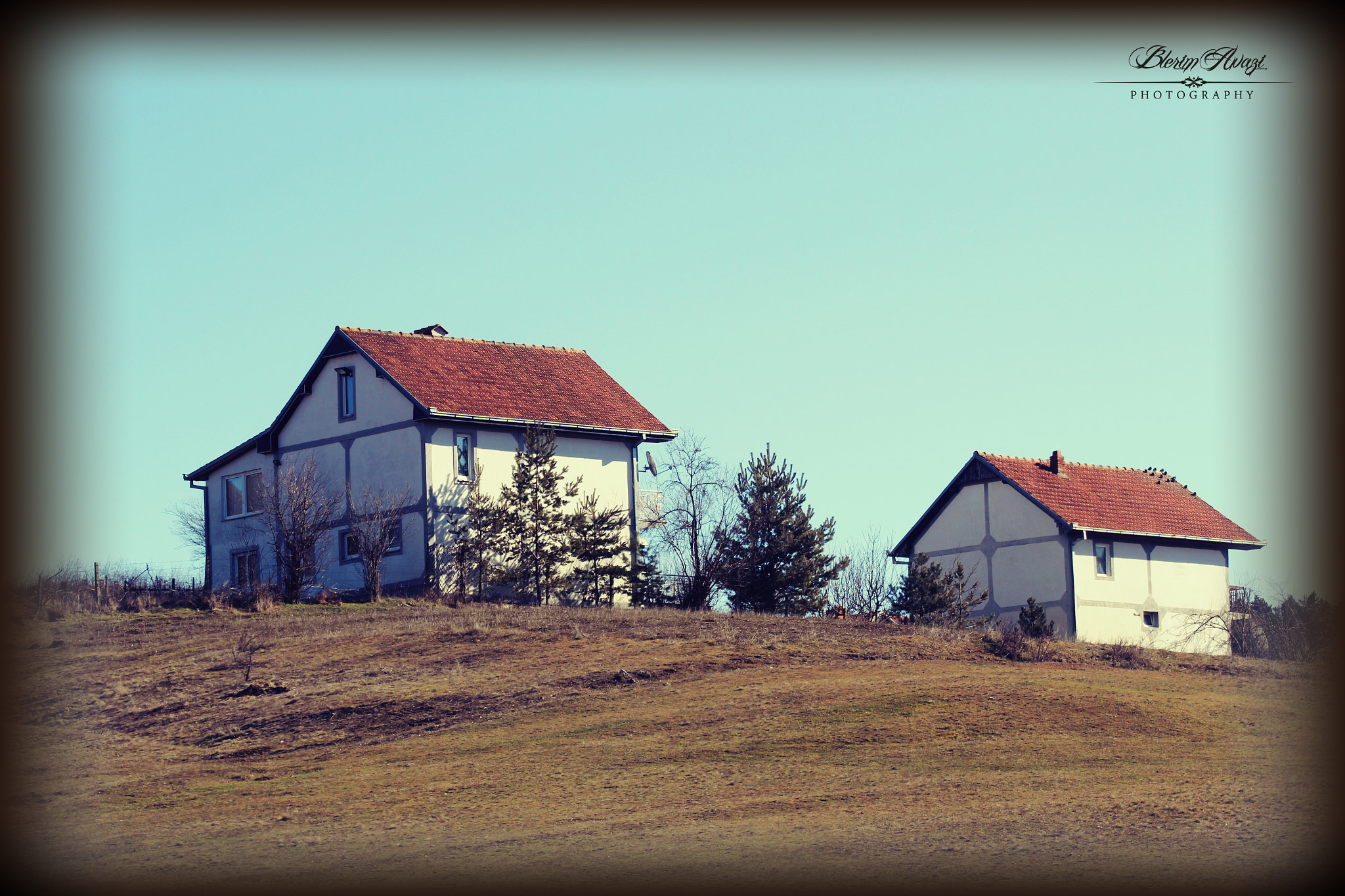 Canon EF 80-200mm F4.5-5.6 II sample photo. Houses photography