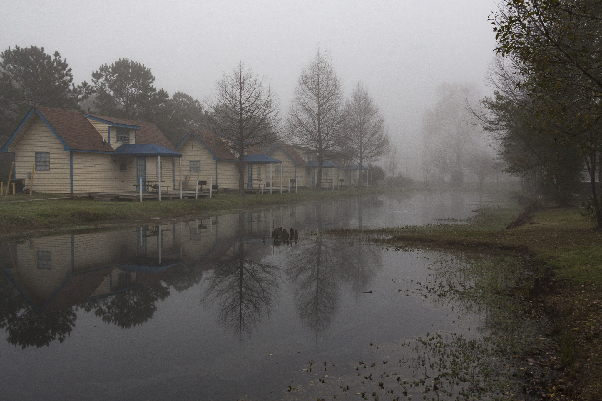 Canon EOS 50D + Tamron 18-270mm F3.5-6.3 Di II VC PZD sample photo. Cabins in the fog photography