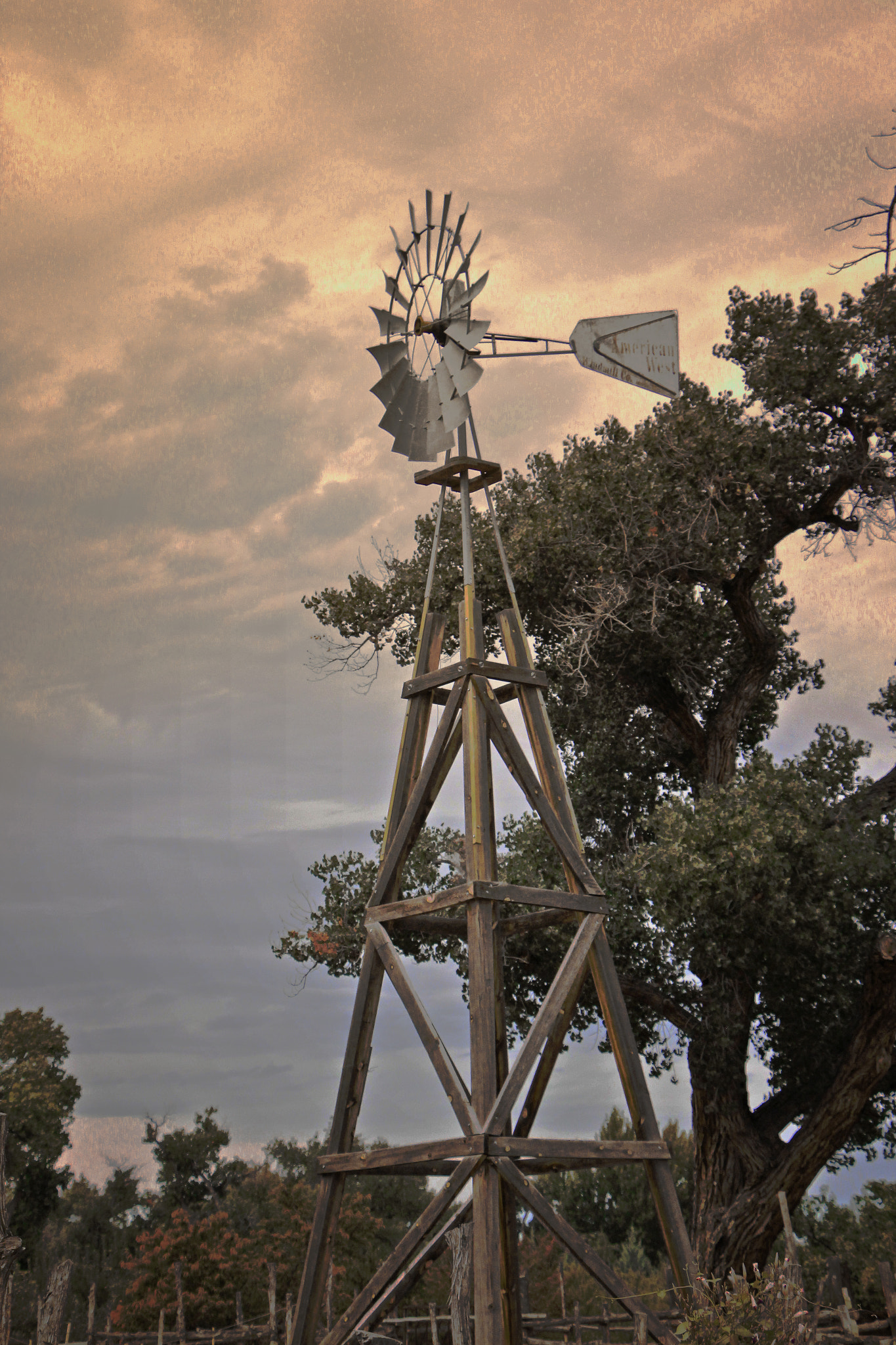 Canon EF-S 18-135mm F3.5-5.6 IS STM sample photo. Old windmill with beautiful sunset photography