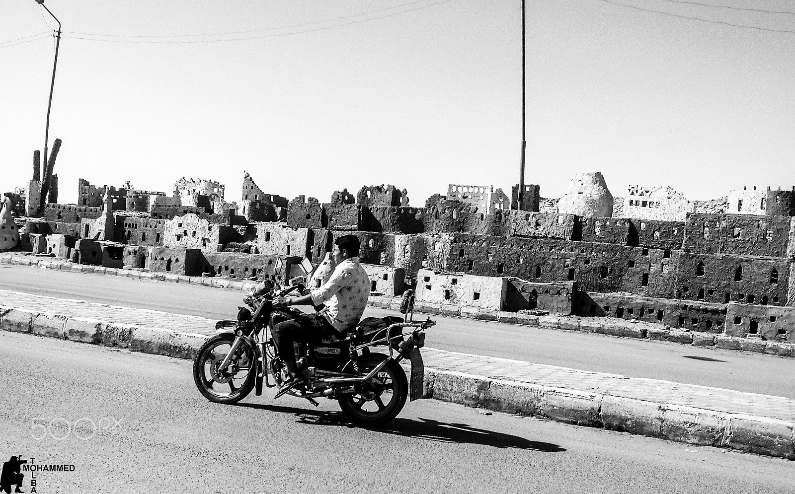 iPad back camera 4.28mm f/2.4 sample photo. Bike rider in al wahat al bahria egypt photography