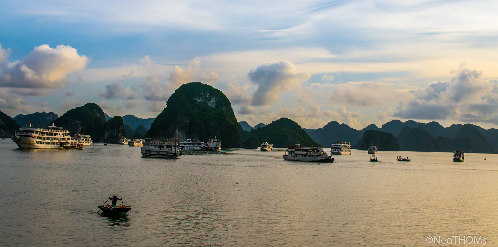 Panasonic Lumix DMC-GF6 + Olympus M.Zuiko Digital 25mm F1.8 sample photo. Boats on ha long sunset photography