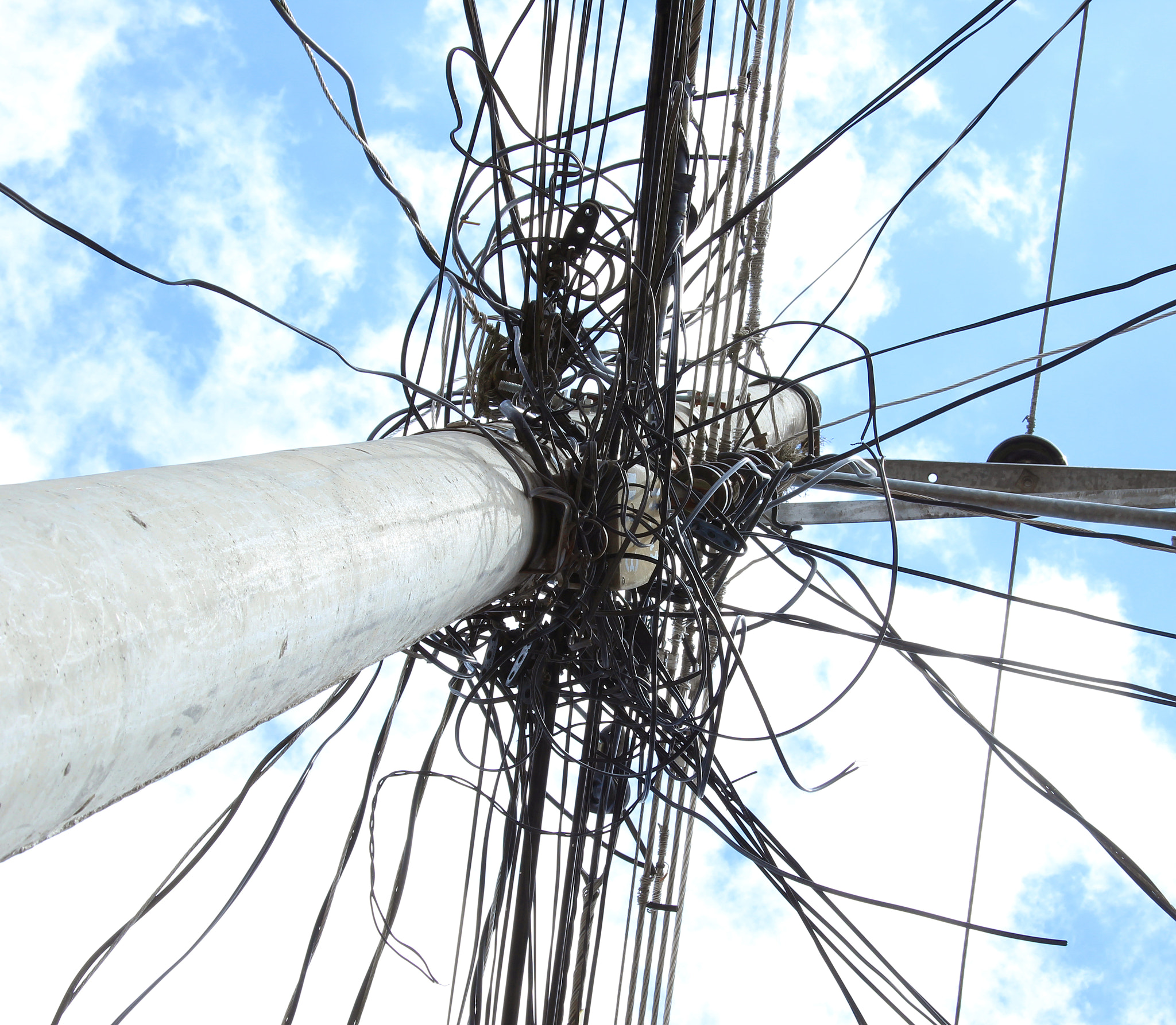 Canon EF-S 18-55mm F3.5-5.6 sample photo. Wires on a utility pole photography