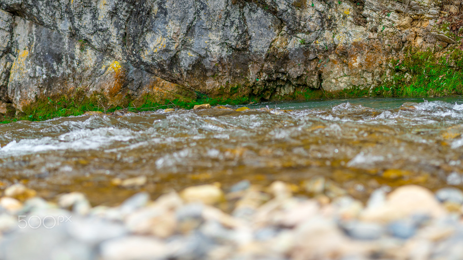 Panasonic Lumix G 42.5mm F1.7 ASPH Power OIS sample photo. Creek in rocks photography