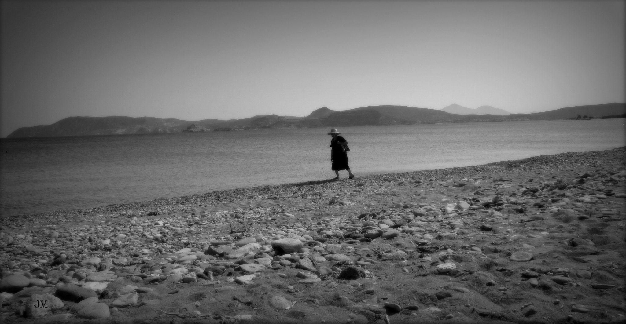 Canon POWERSHOT A3350 IS sample photo. Old lady walking by the sea photography