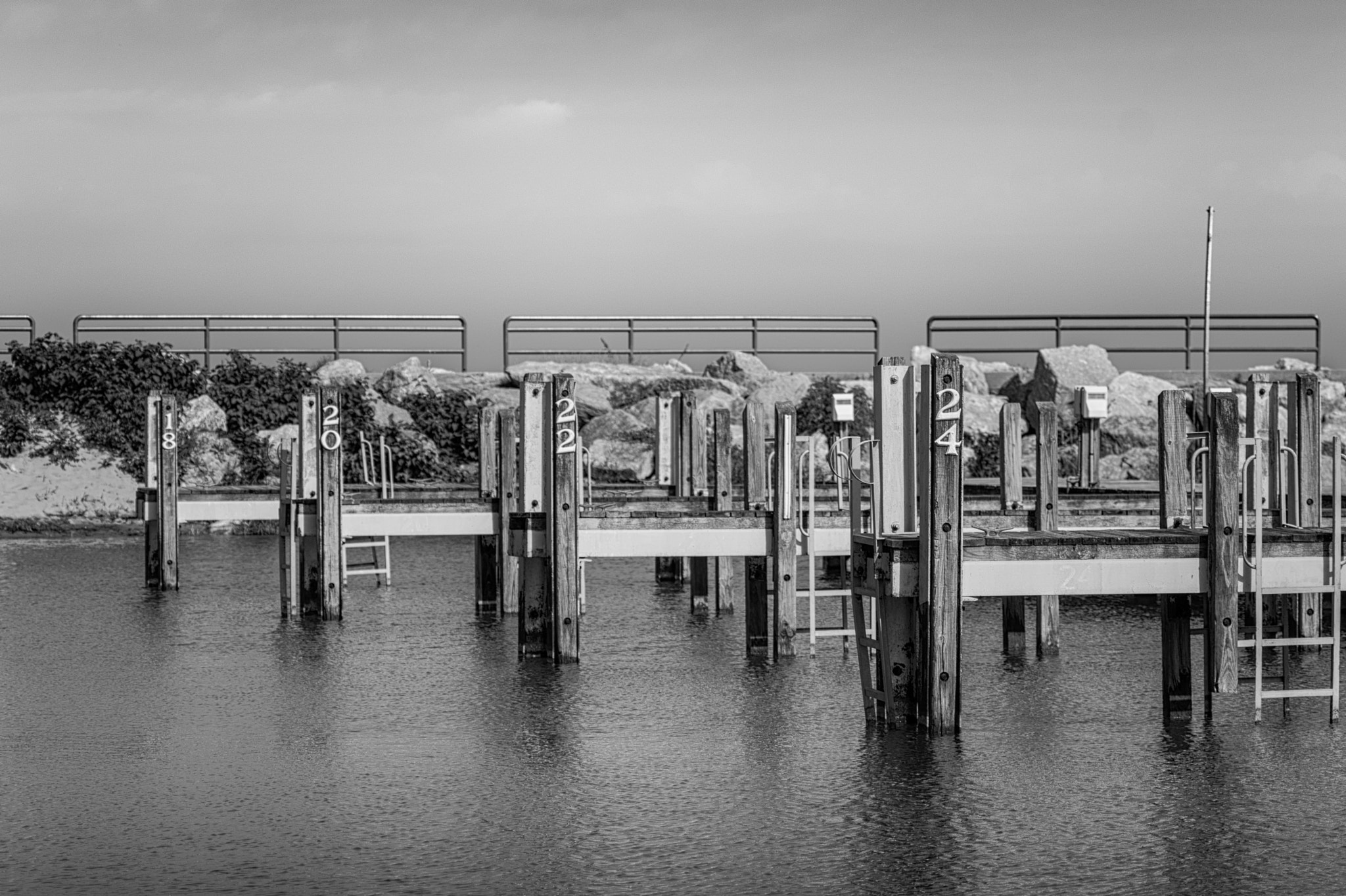 Nikon D7100 + AF Zoom-Nikkor 70-210mm f/4 sample photo. Docks in b&amp;w photography