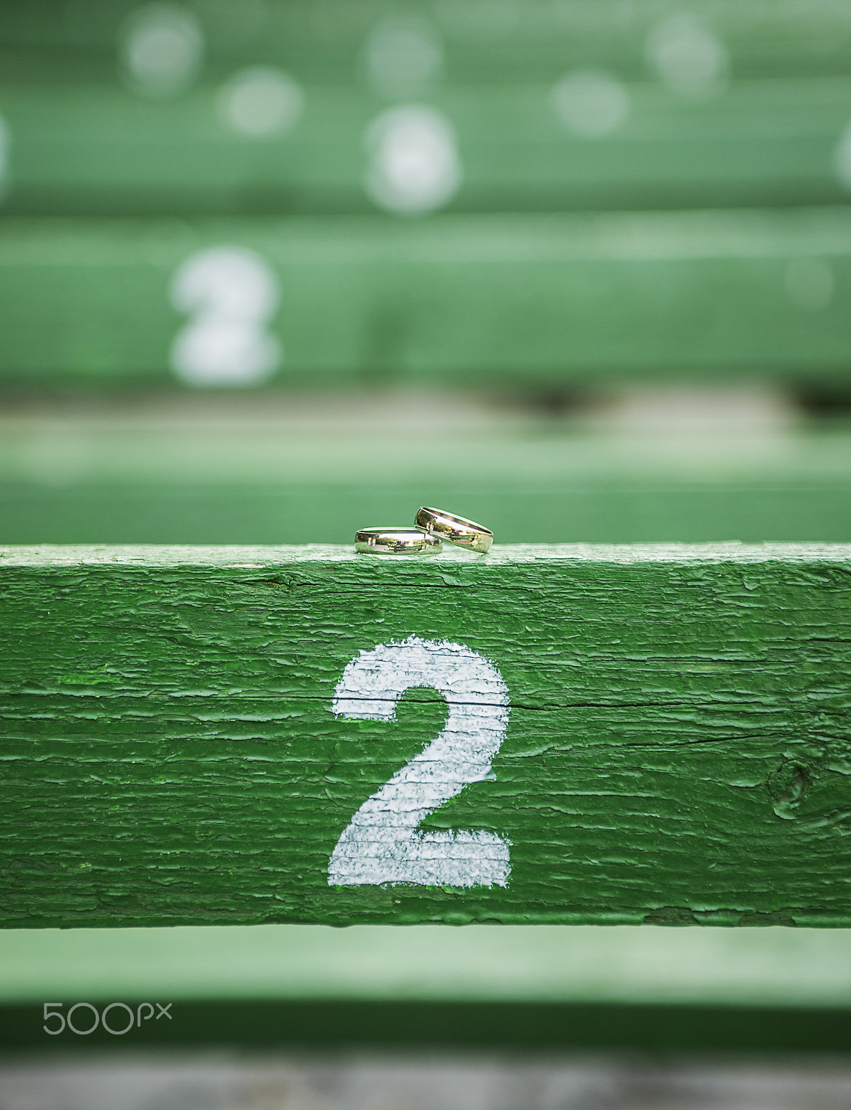 Nikon D610 + Sigma 24-70mm F2.8 EX DG Macro sample photo. Wedding rings on a wooden background photography