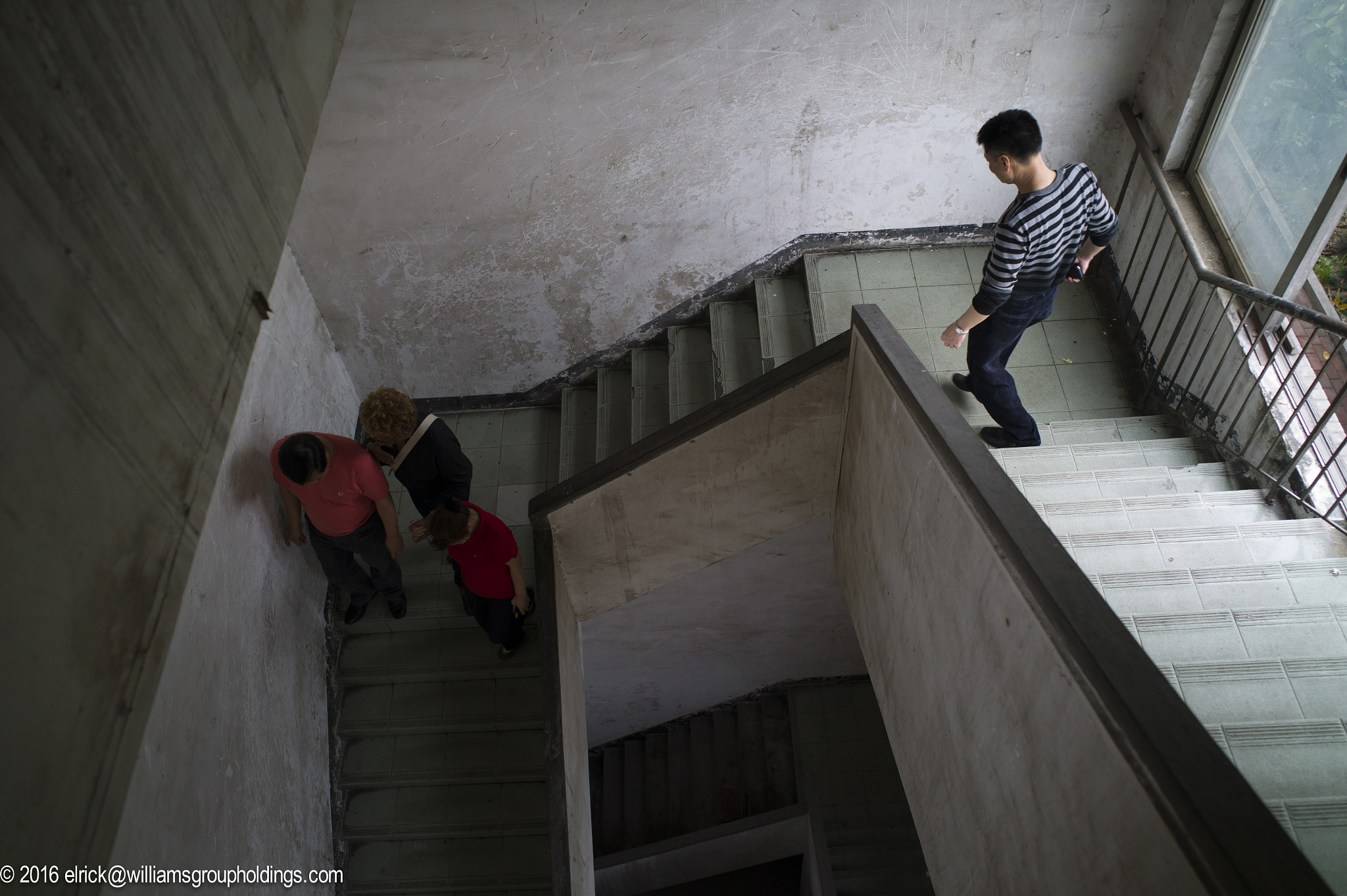Leica M9 + Leica Summicron-M 28mm F2 ASPH sample photo. Man descending tenement stairs photography