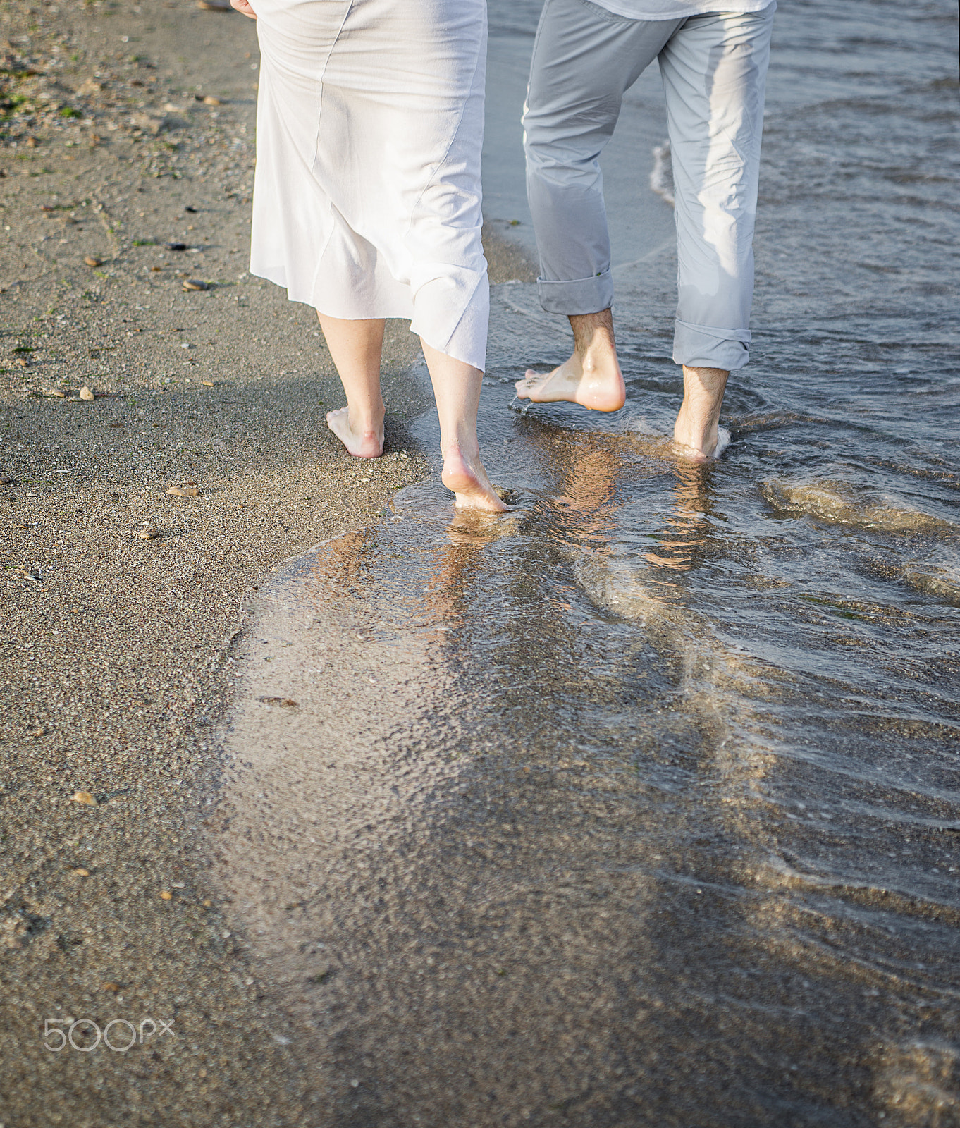 Sigma 24-70mm F2.8 EX DG Macro sample photo. Legs of couple on the sand beach photography