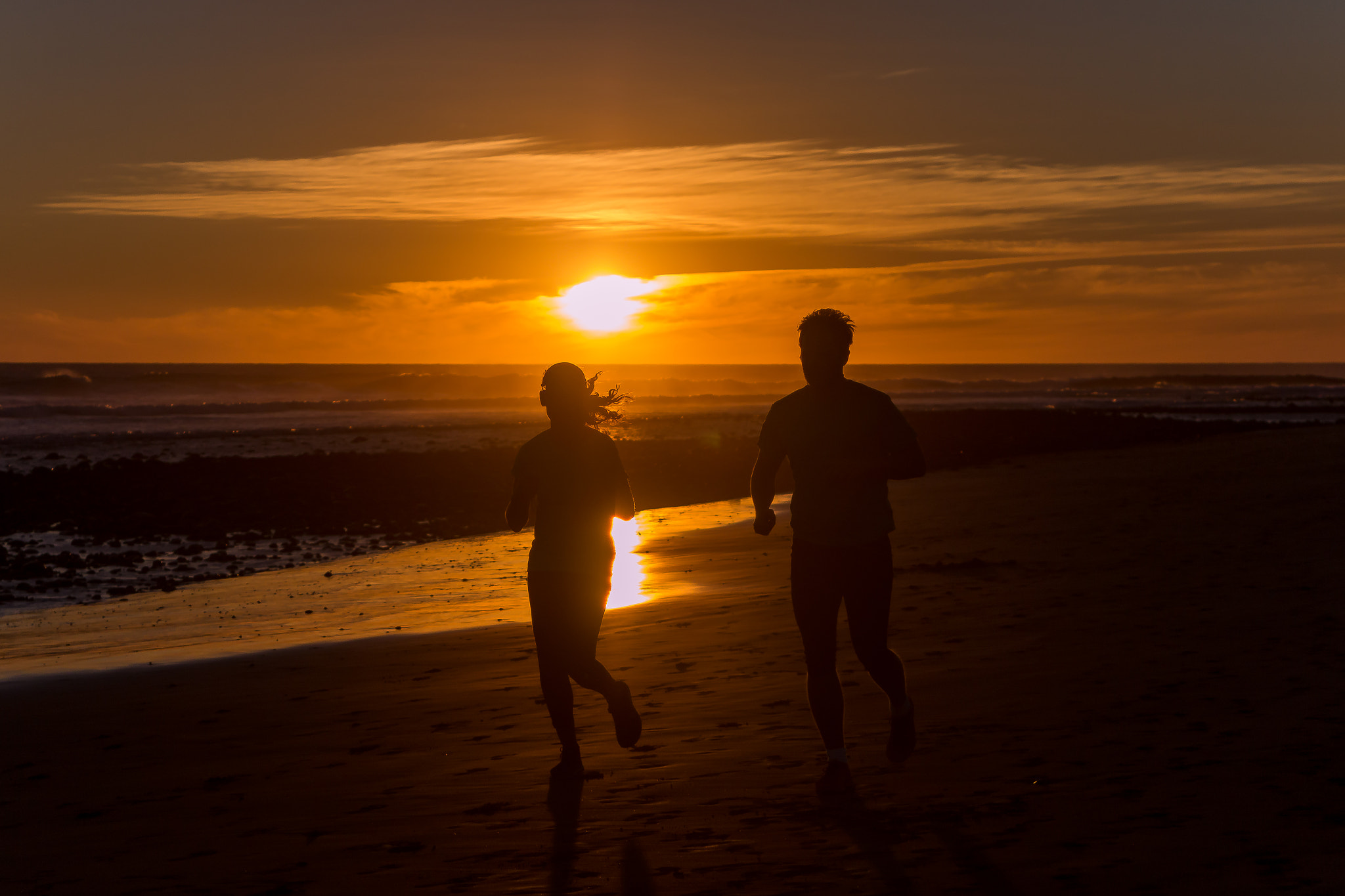 Canon EF 28-105mm f/3.5-4.5 USM sample photo. Runners at sunset photography