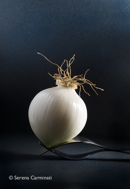 Nikon D800 + AF Nikkor 50mm f/1.8 sample photo. Peeled white onion on forks photography
