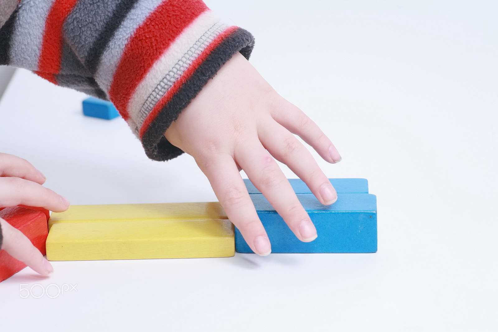 Canon EOS 5D + Tamron SP AF 90mm F2.8 Di Macro sample photo. Child hands play isolated toy photography