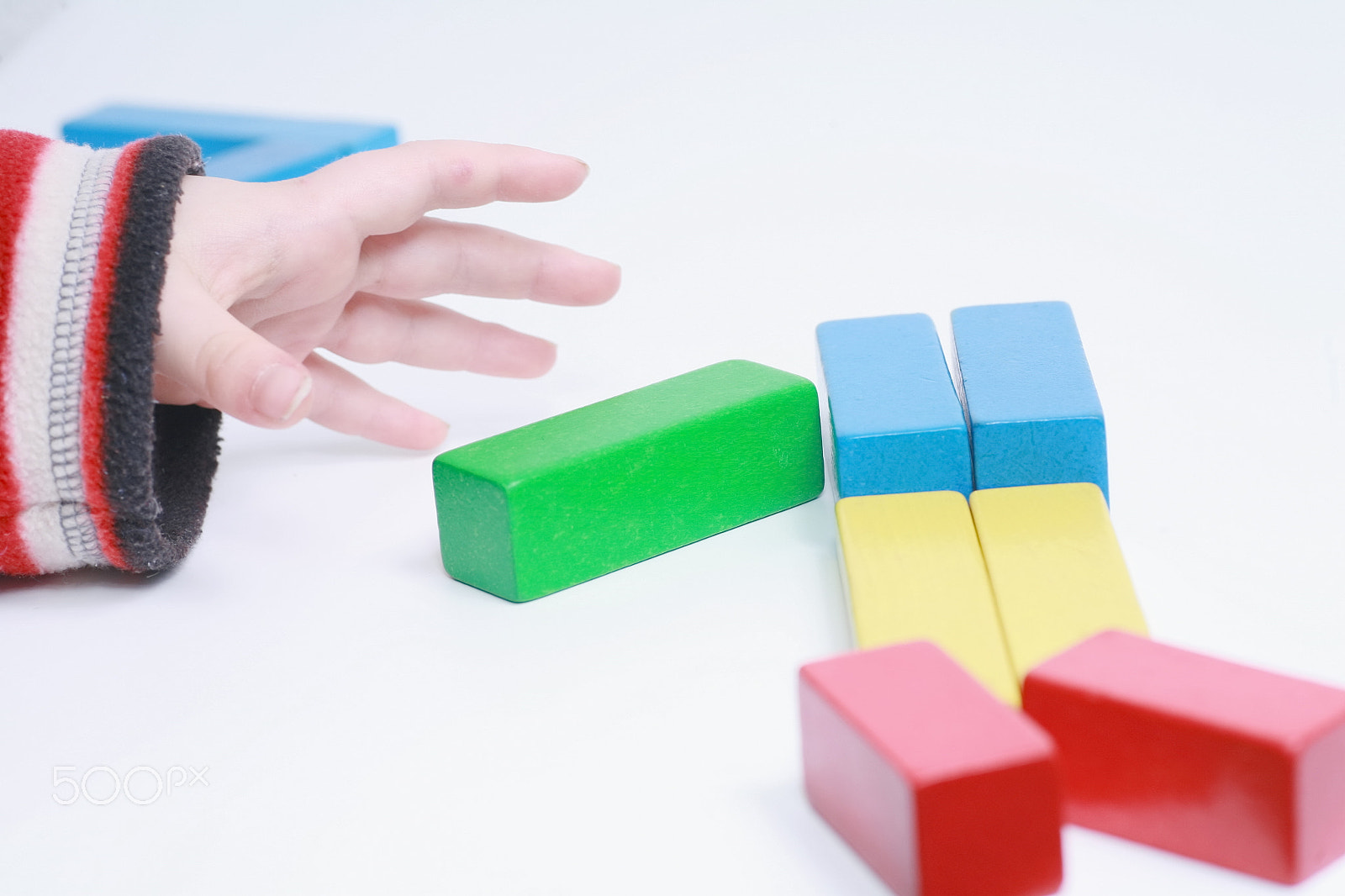 Canon EOS 5D + Tamron SP AF 90mm F2.8 Di Macro sample photo. Child hands play isolated toy photography
