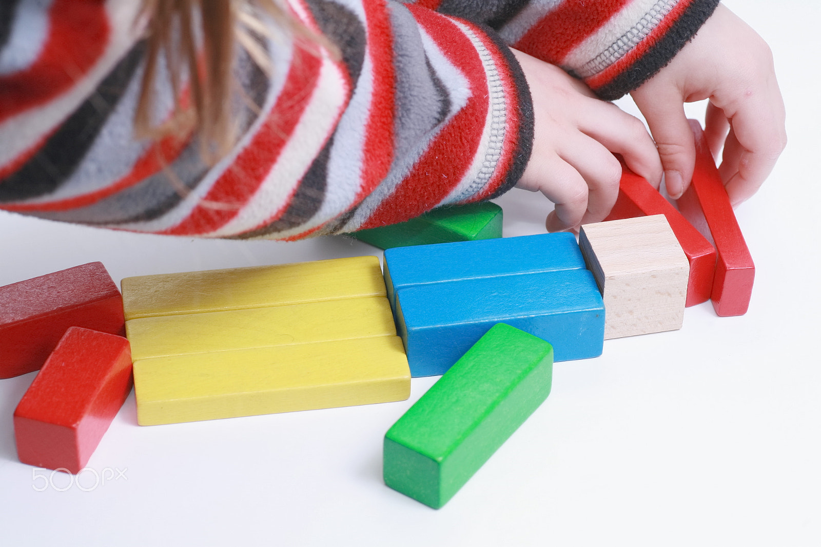 Canon EOS 5D + Tamron SP AF 90mm F2.8 Di Macro sample photo. Child hands play isolated toy photography