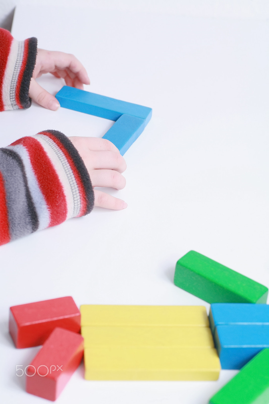 Canon EOS 5D + Tamron SP AF 90mm F2.8 Di Macro sample photo. Child hands play isolated toy photography
