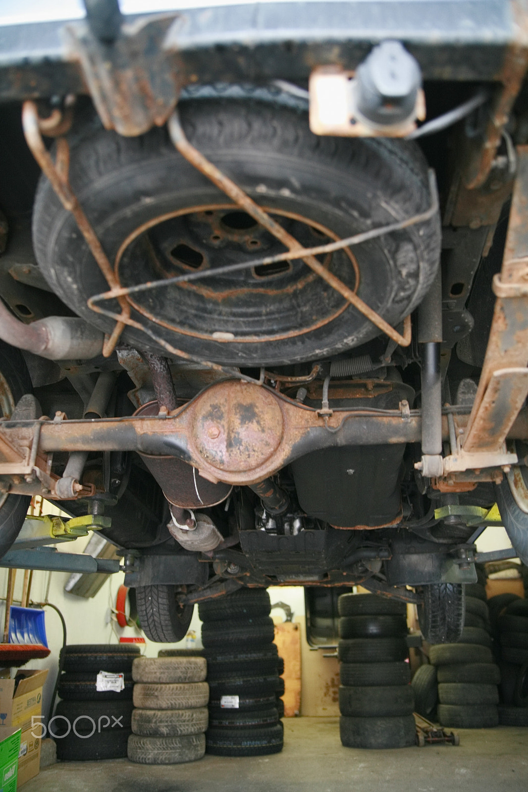 Canon EOS 5D + Canon EF 50mm f/1.8 sample photo. Automechanic car repair photography