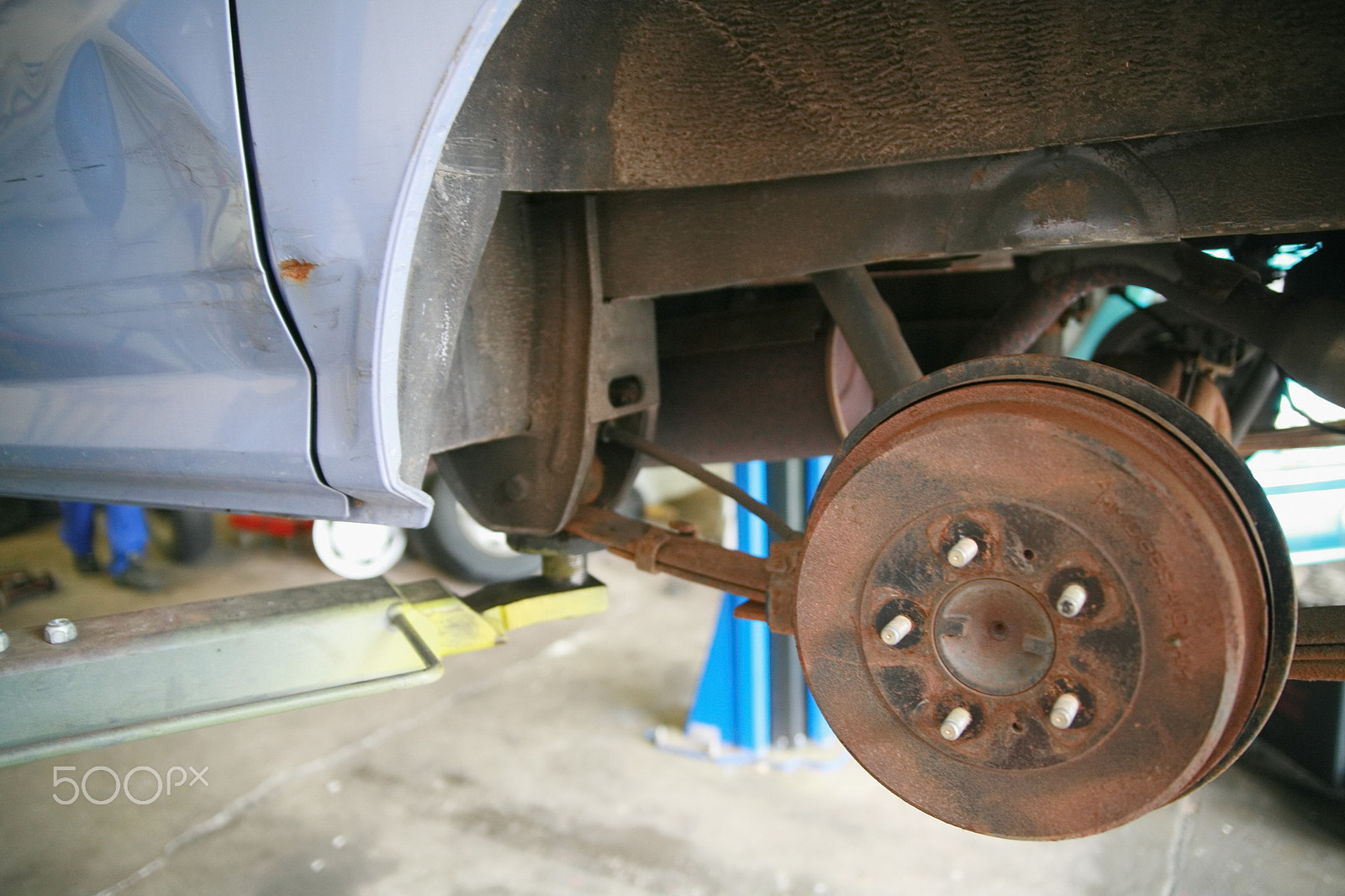 Canon EOS 5D + Canon EF 50mm f/1.8 sample photo. Automechanic car repair photography