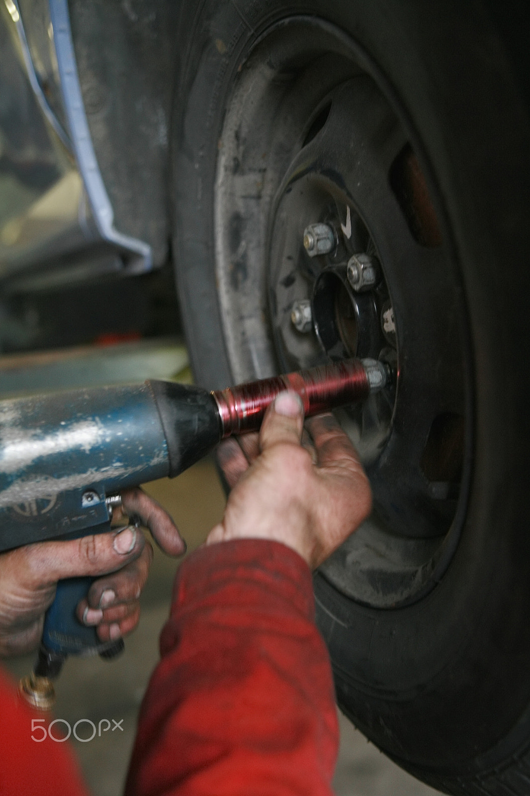 Canon EOS 5D + Canon EF 50mm f/1.8 sample photo. Automechanic car repair photography