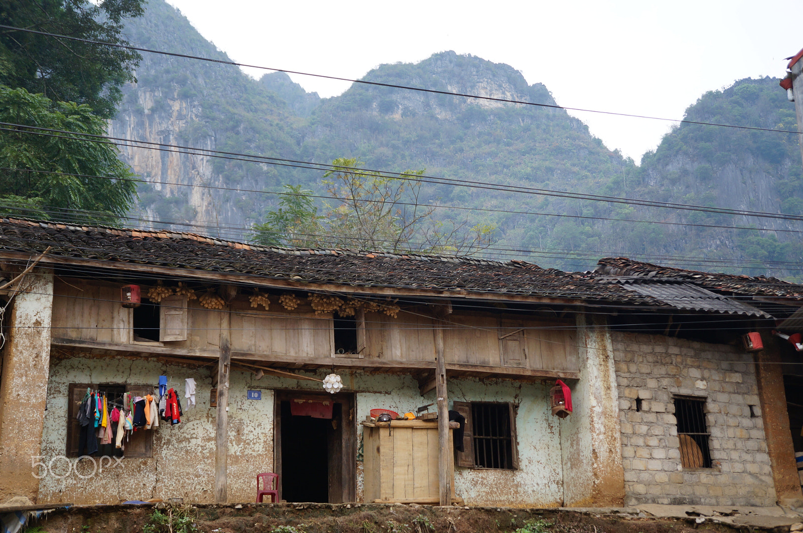 Sony Alpha NEX-F3 + Tamron 18-200mm F3.5-6.3 Di III VC sample photo. Old house in dong van, vietnam photography