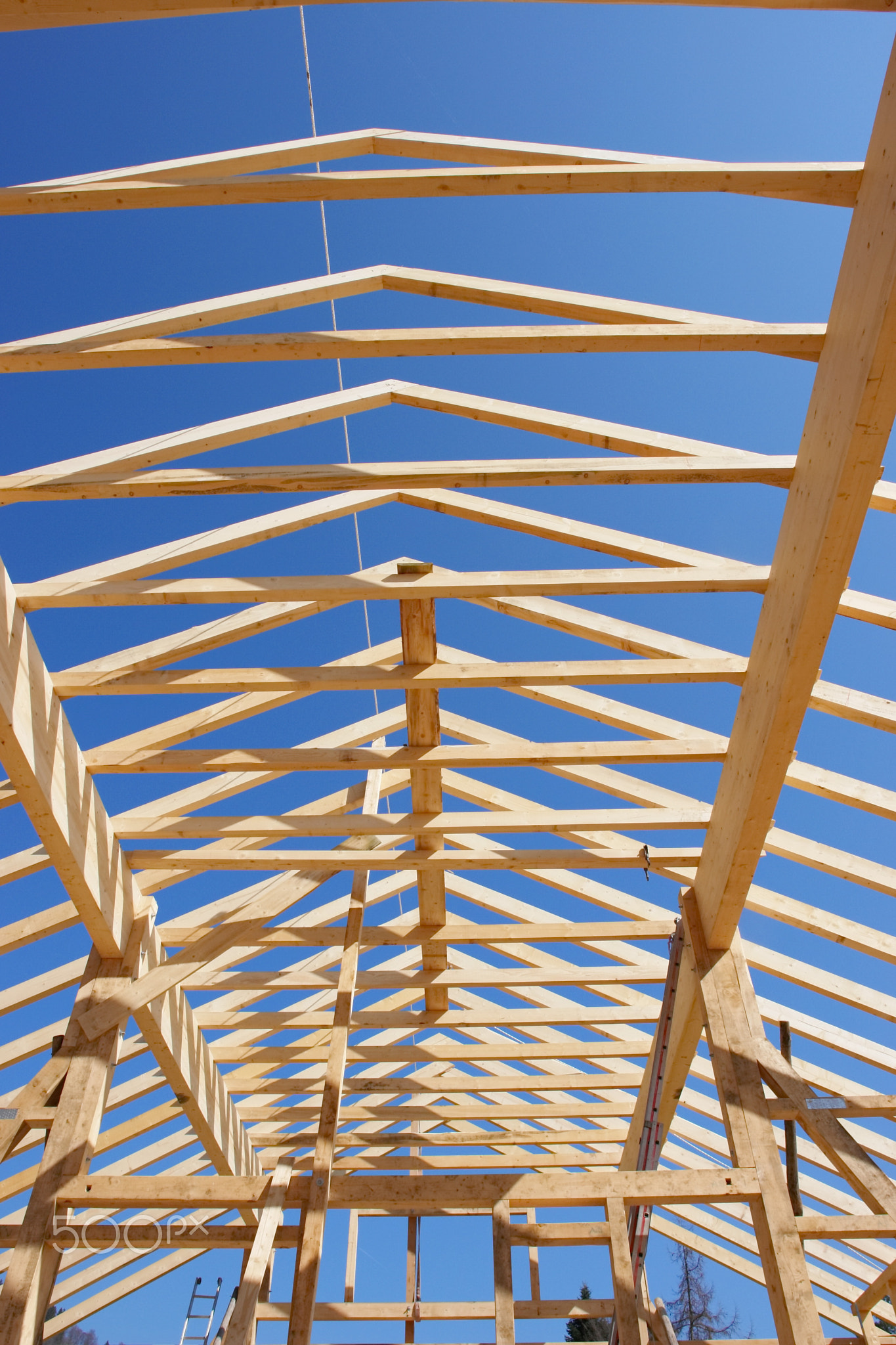 building house wooden shell construction blue sky