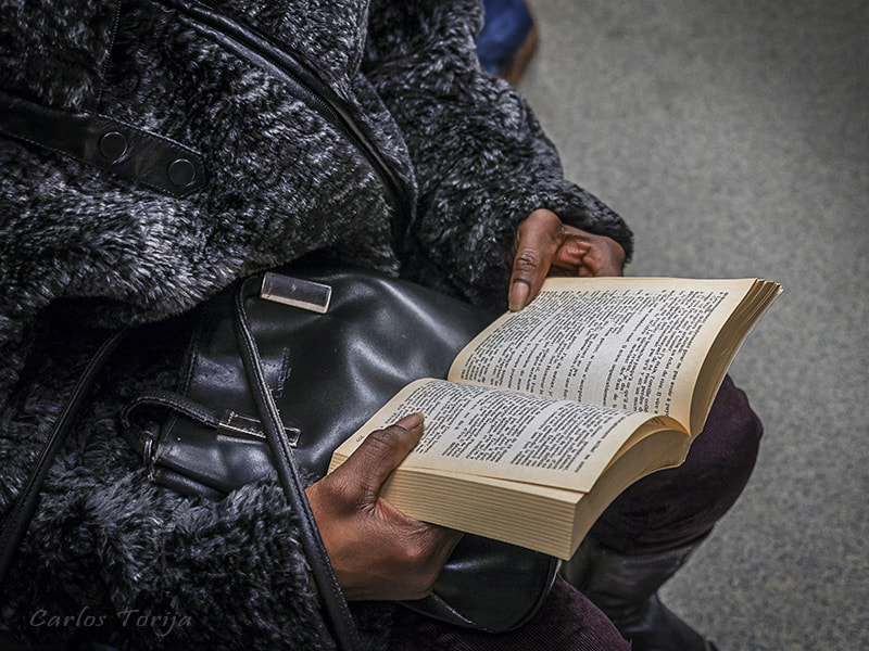 Panasonic Lumix G X Vario 12-35mm F2.8 ASPH Power OIS sample photo. Woman reading photography
