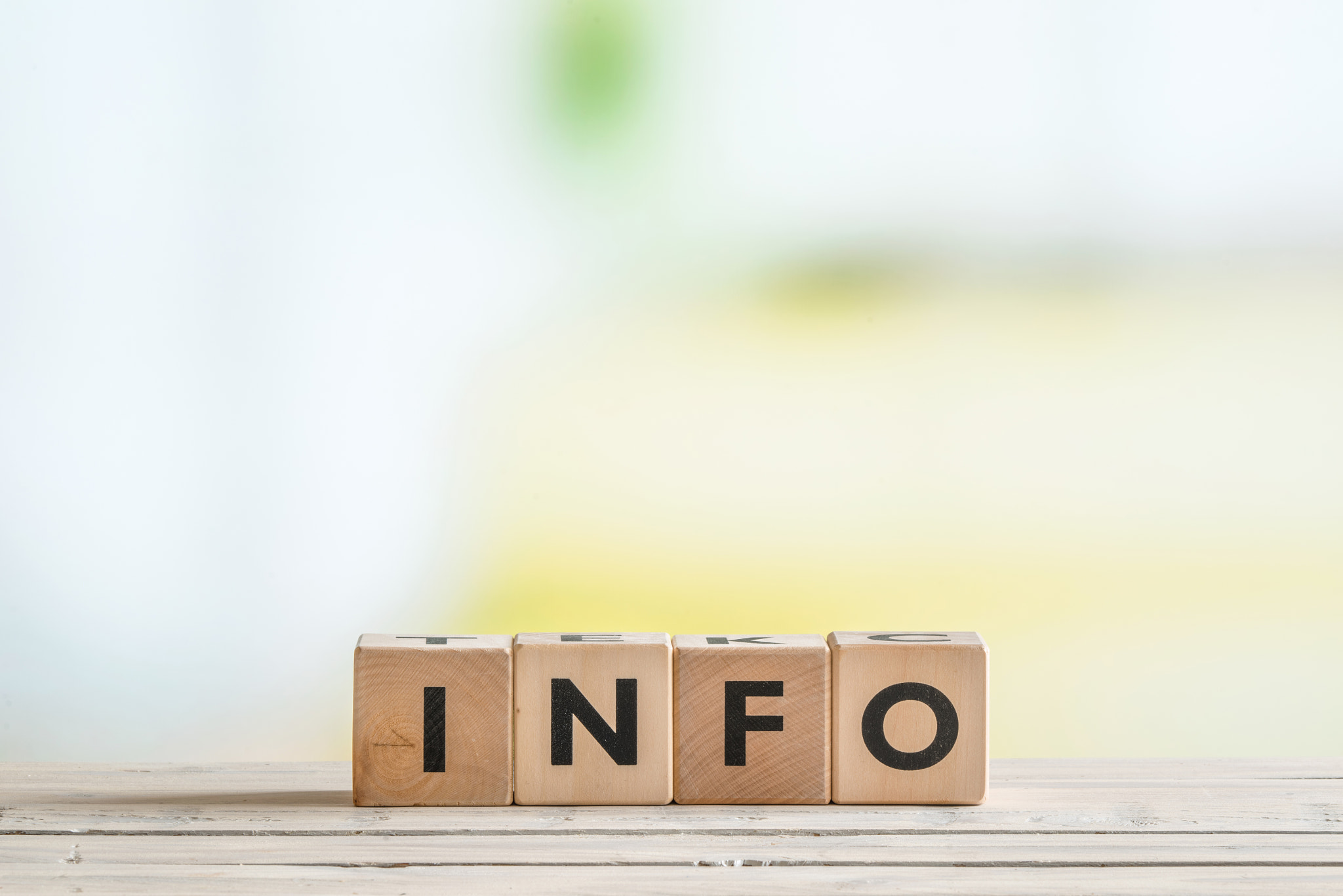 Info sign made of wooden cubes