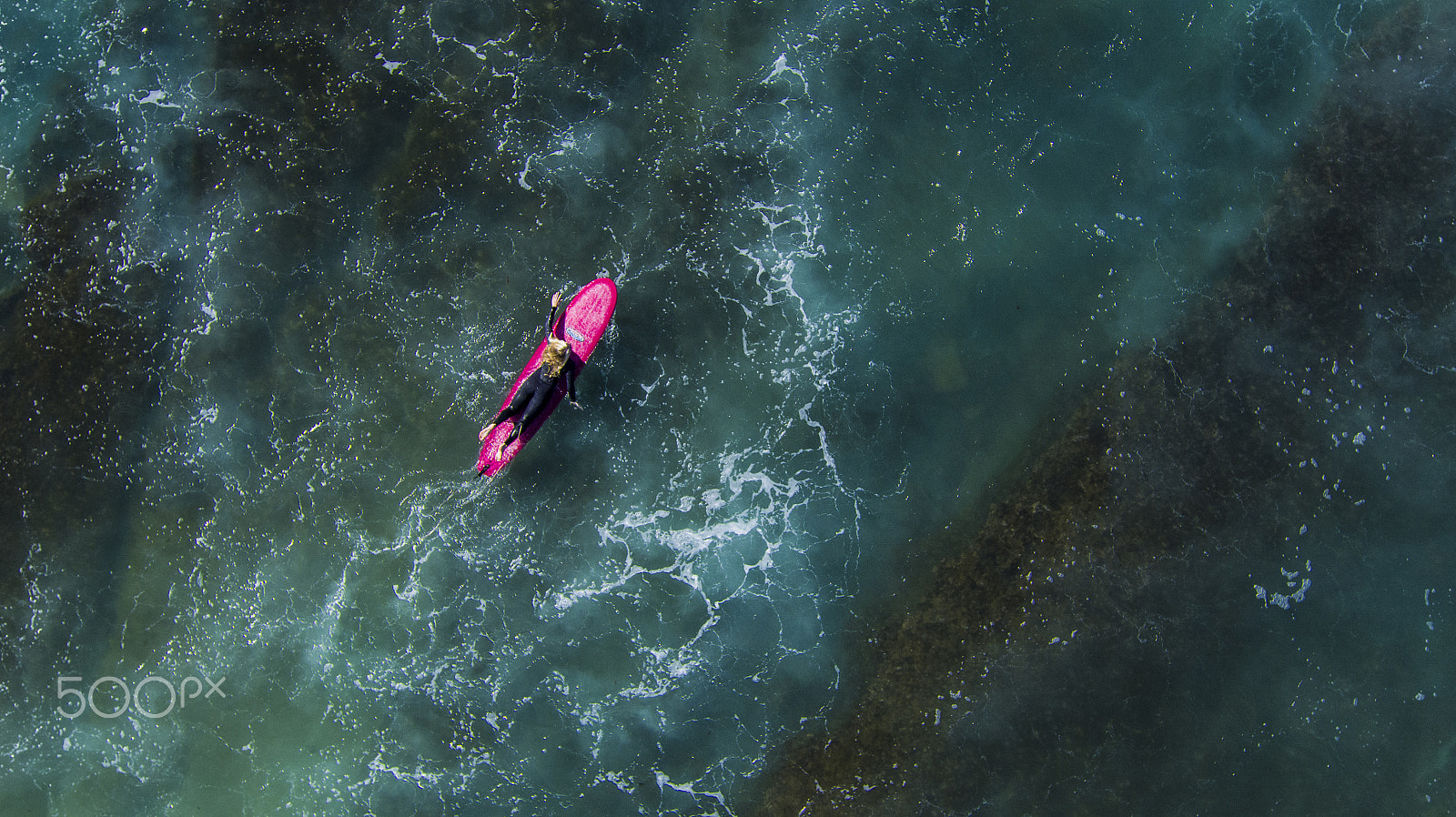 DJI FC550 + OLYMPUS M.12mm F2.0 sample photo. Surfer girl padding out photography