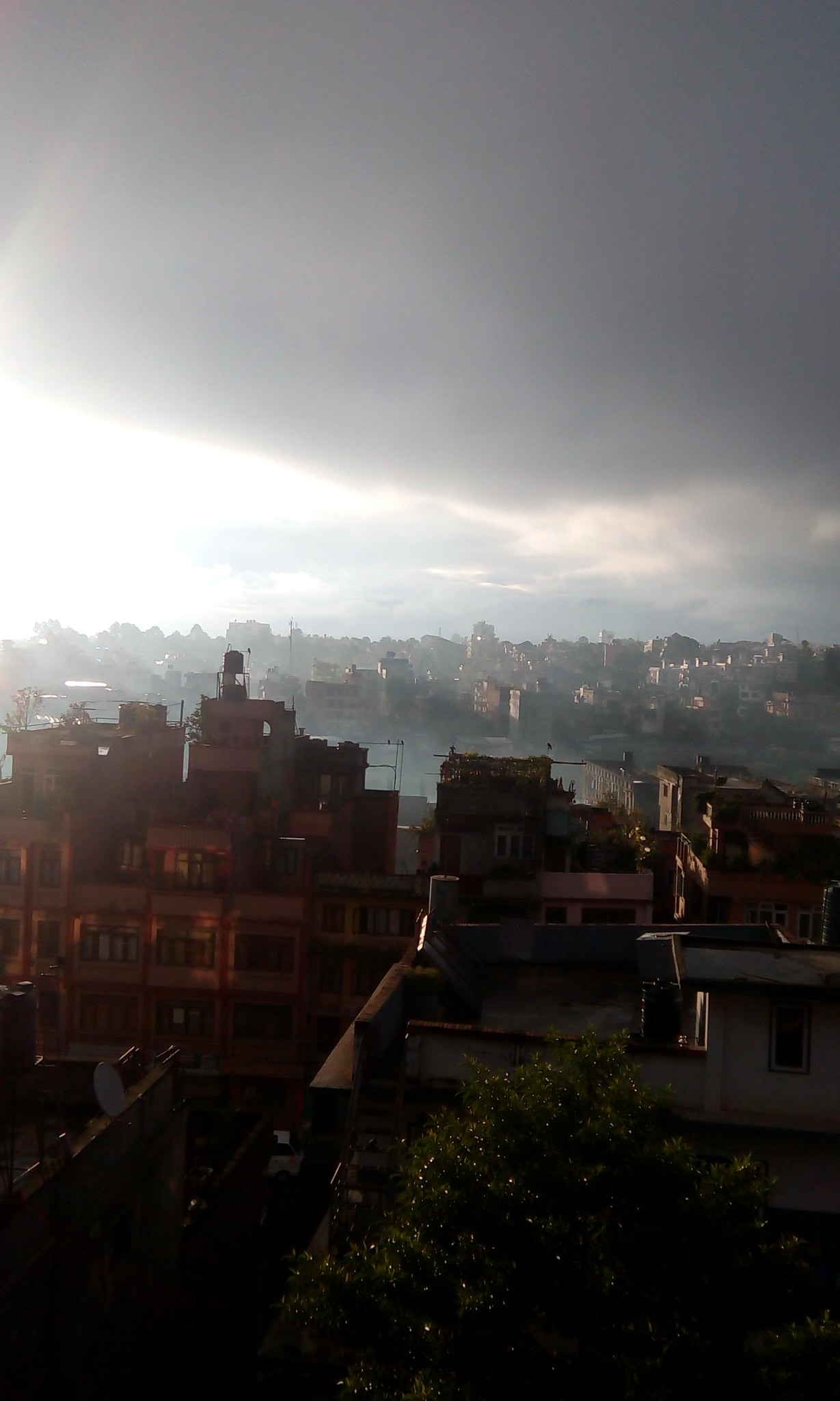 HTC DESIRE 620G DUAL SIM sample photo. City inside clouds photography