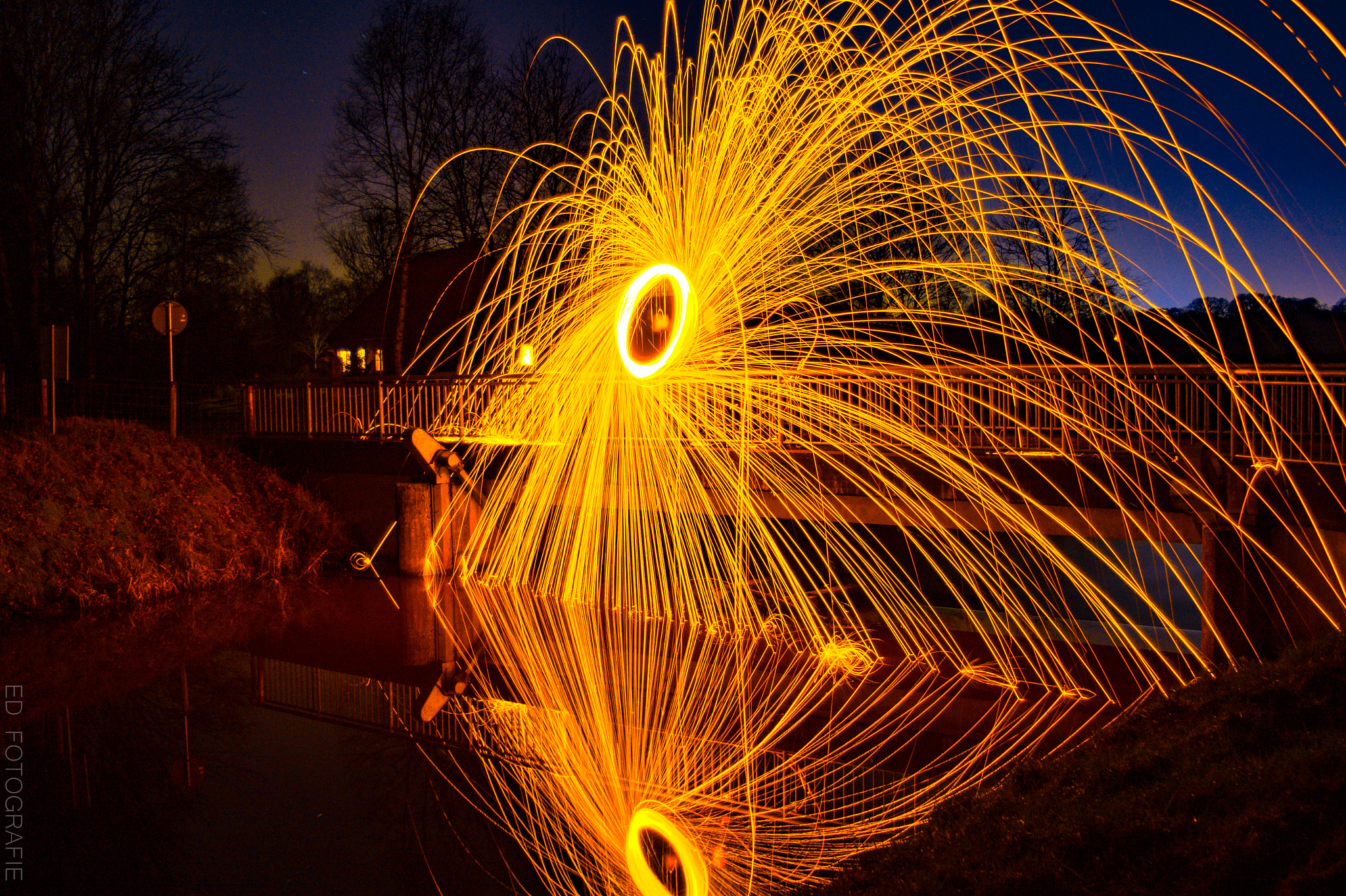Sony SLT-A58 + Sigma UC AF 28-70mm F3.5-4.5 sample photo. Spinning fire wheel photography