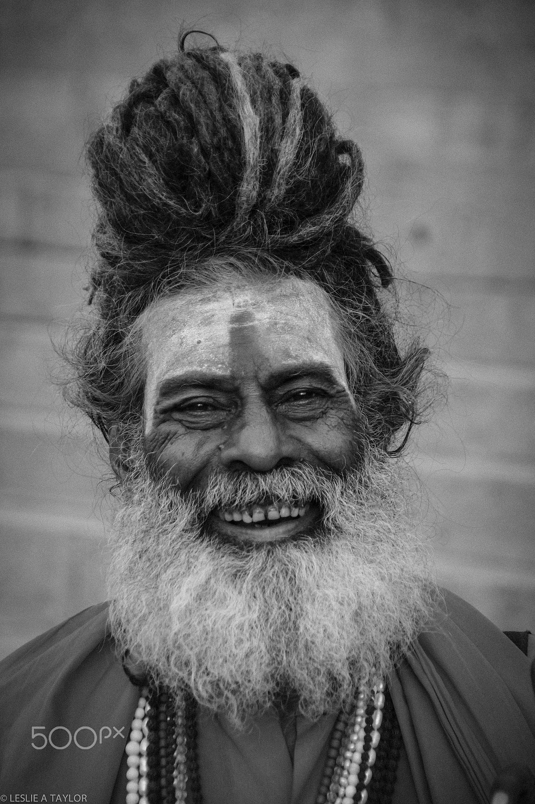 Canon EOS 550D (EOS Rebel T2i / EOS Kiss X4) + Tamron 18-270mm F3.5-6.3 Di II VC PZD sample photo. Local sadhu at the river ganges photography