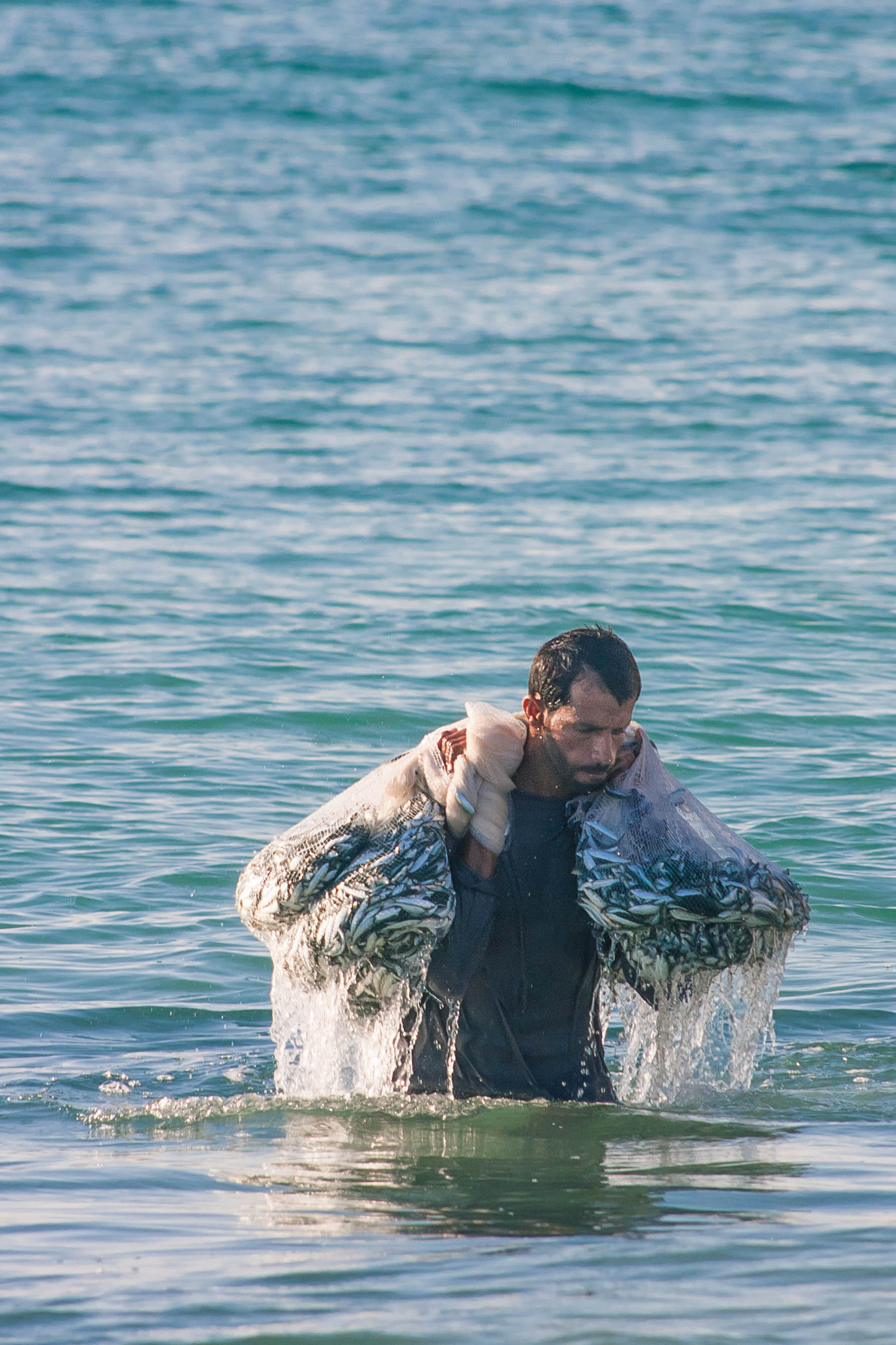Canon EF 35-350mm F3.5-5.6L USM sample photo. Fisherman photography