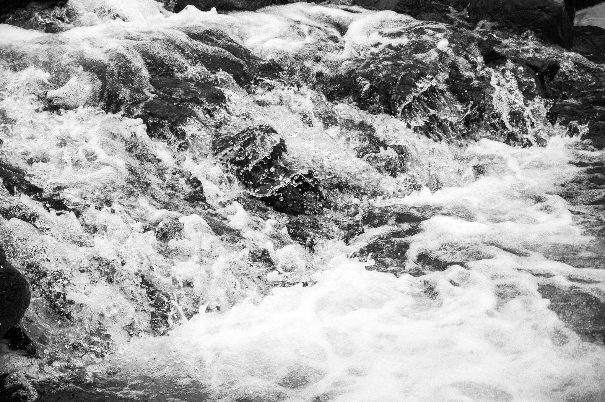 Sigma 17-70mm F2.8-4 DC Macro OS HSM sample photo. Blalck and white rapids photography