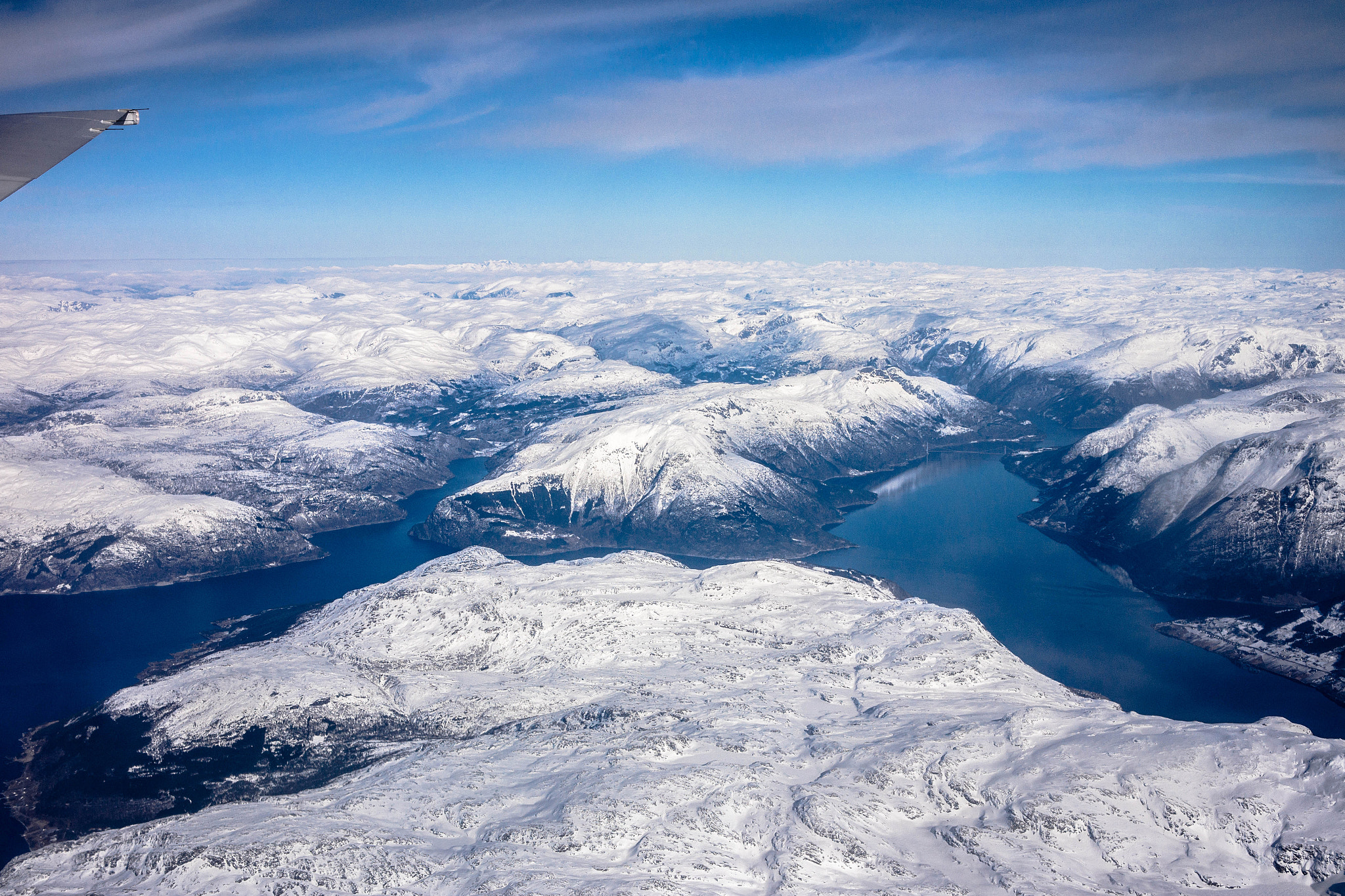 Samsung NX300 + Samsung NX 30mm F2 Pancake sample photo. Hardangerfjorden from the airplane photography