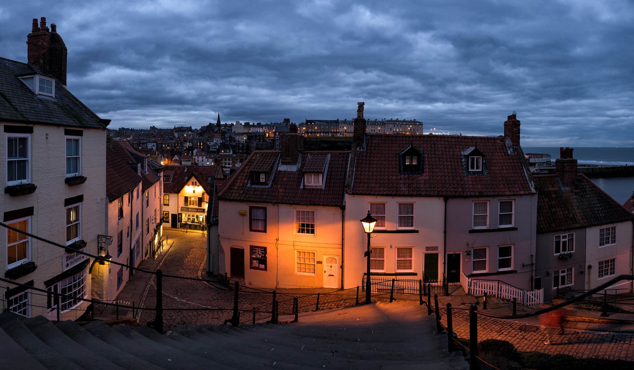 Sony a7R + Sony 70-400mm F4-5.6 G SSM sample photo. Whitby old town by lamplight photography