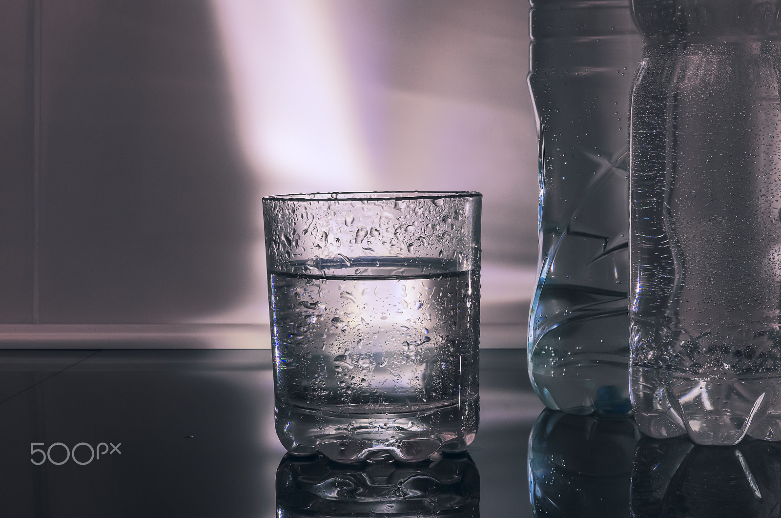 Sony SLT-A65 (SLT-A65V) + Sony DT 50mm F1.8 SAM sample photo. A glass of water on light. photography