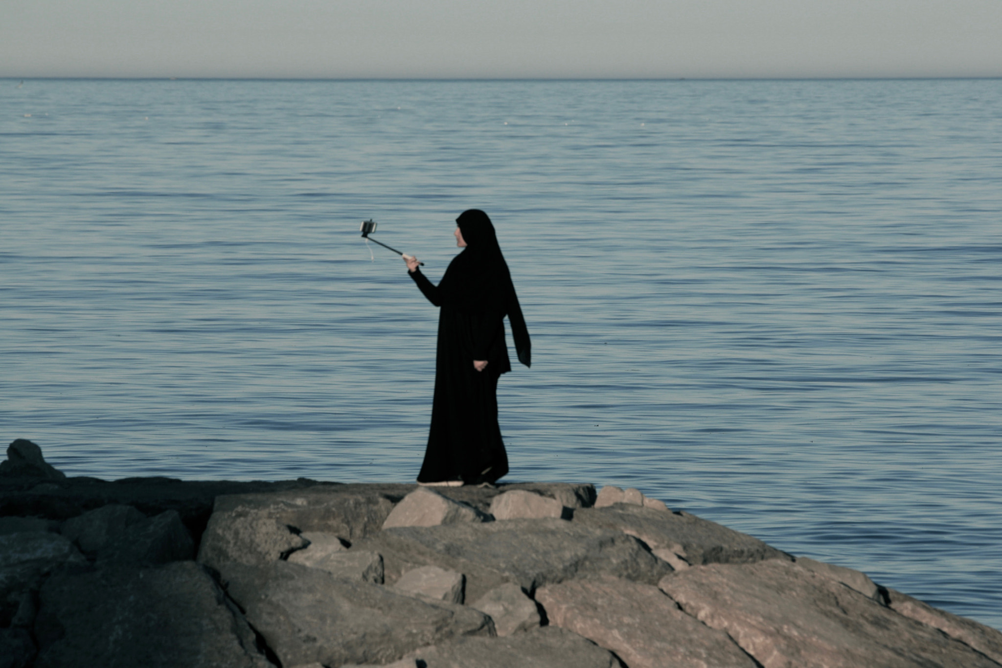 Canon EOS 400D (EOS Digital Rebel XTi / EOS Kiss Digital X) sample photo. Selfie stick by lake photography