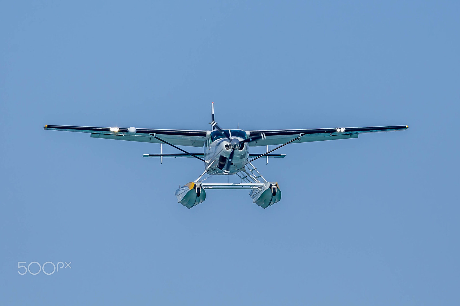 Canon EOS 6D + Canon EF 400mm F5.6L USM sample photo. Cessna 208 caravan amphibian photography