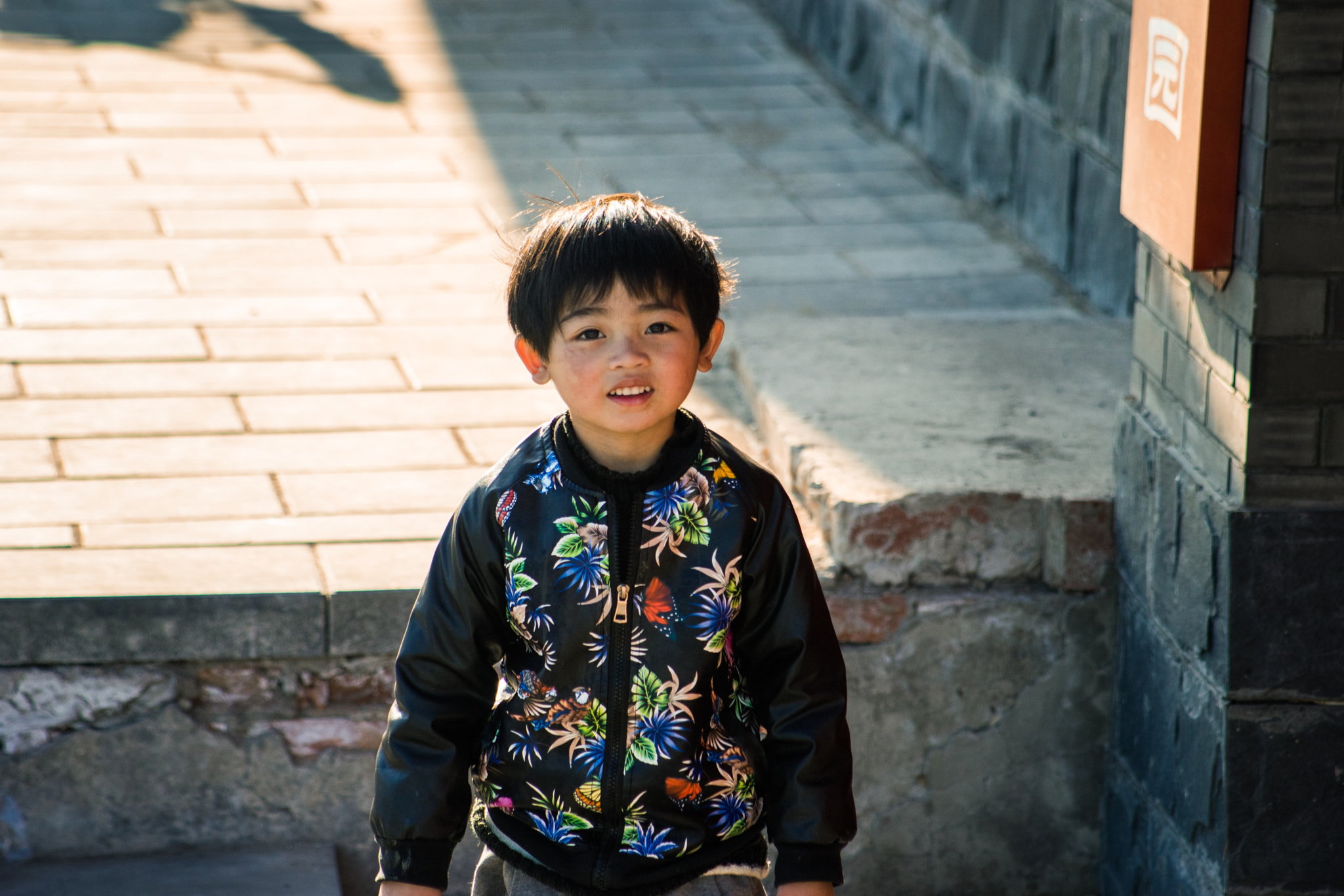 Minolta AF 80-200mm F4.5-5.6 sample photo. Smiling child photography